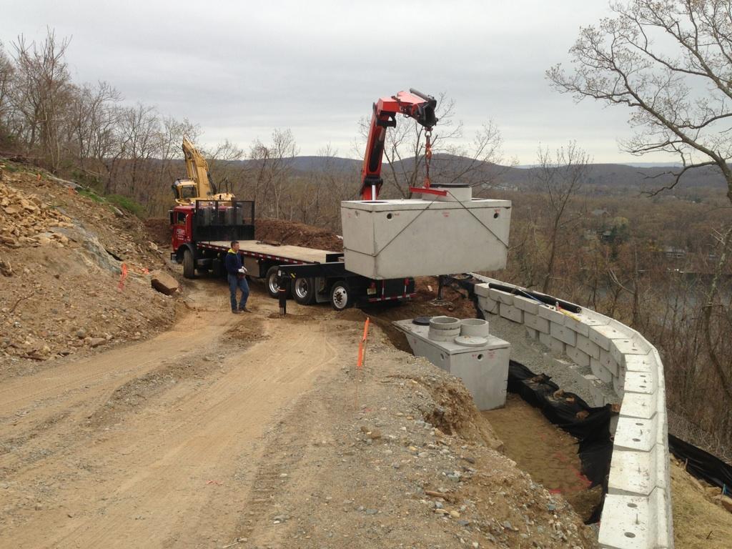 Truck transferring septic tank