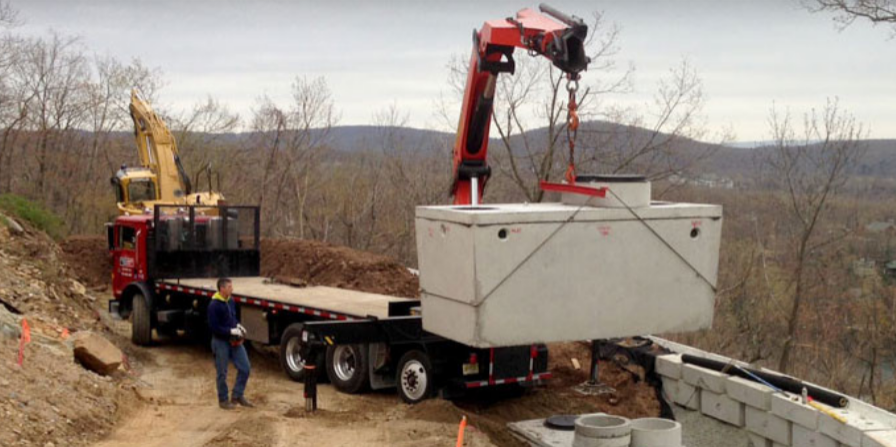 A truck transferring septic system