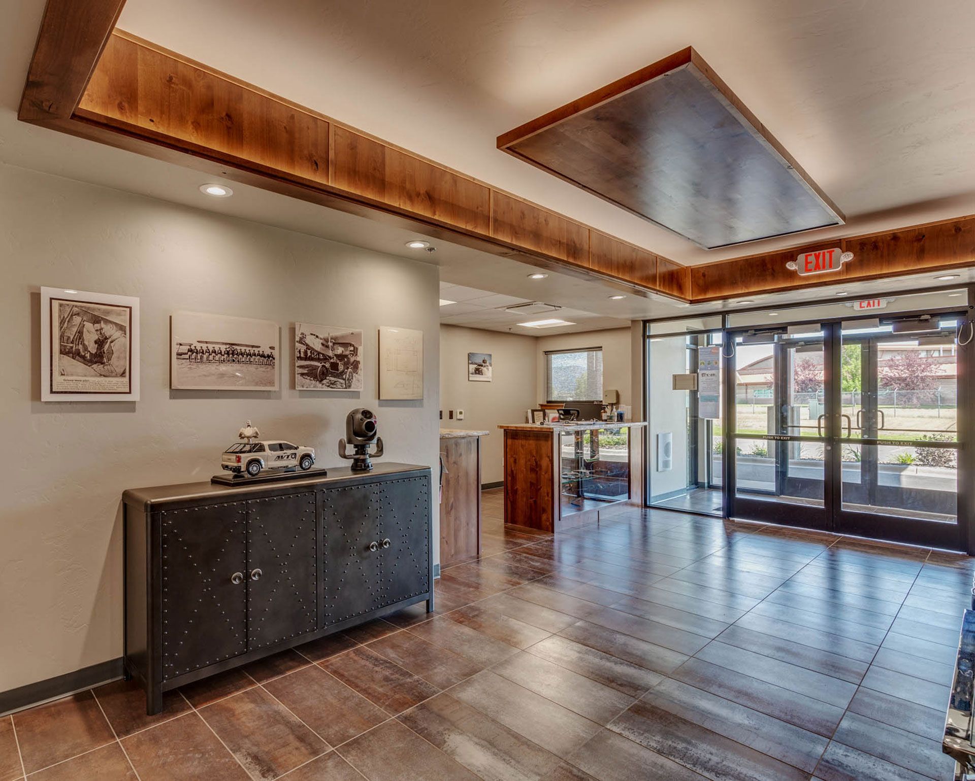 A large room with a wooden floor and a wooden ceiling