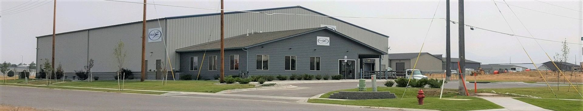 A large building with a fire hydrant in front of it