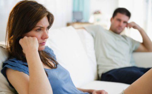 couple sitting apart