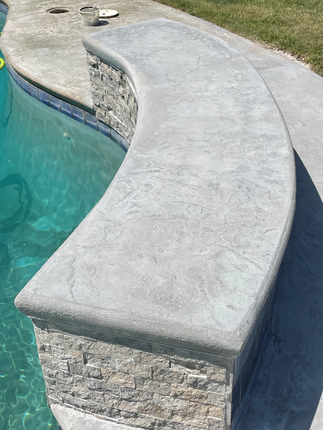 Pool area finished stone design