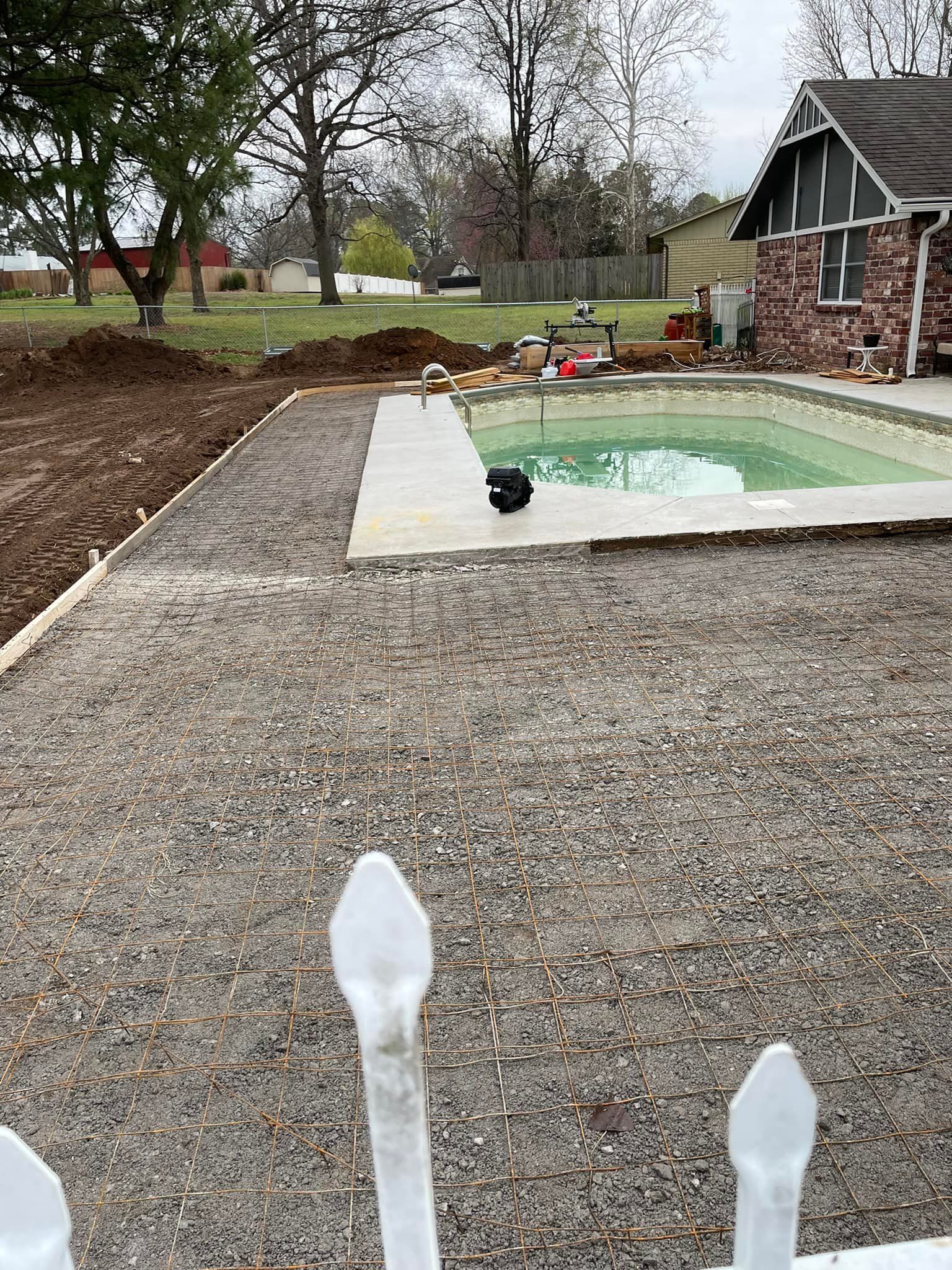 Swimming pool decking construction