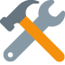 Gray wrench and orange screwdriver crossed in a repair tools icon on white background