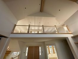 A house with a loft and stairs in it