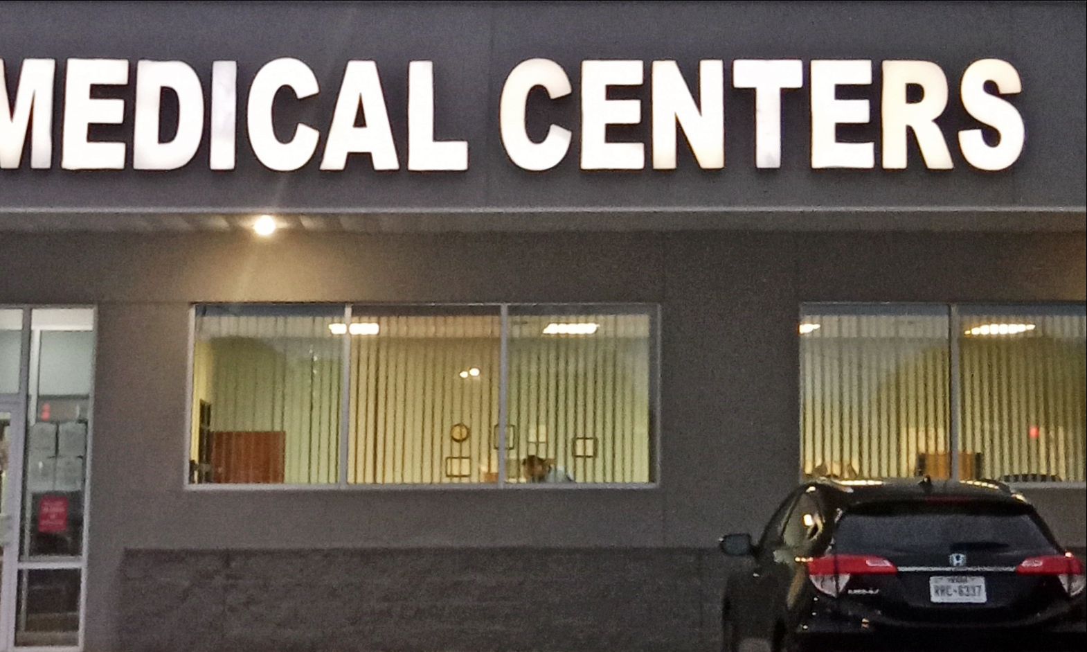 MEDICAL CENTERS sign above a medical office building.