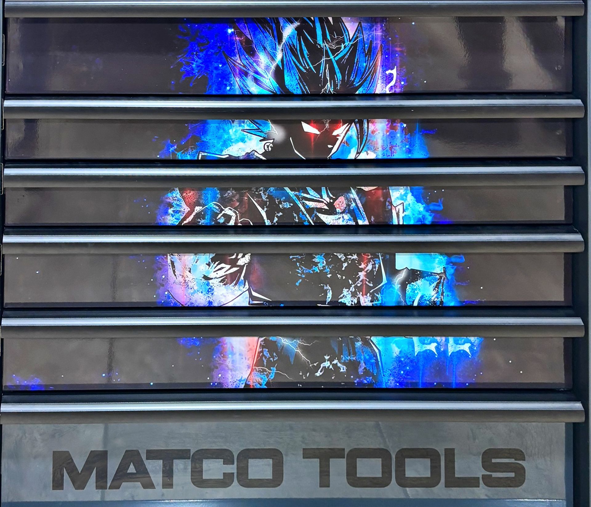 Matco Tools logo with a superhero design
