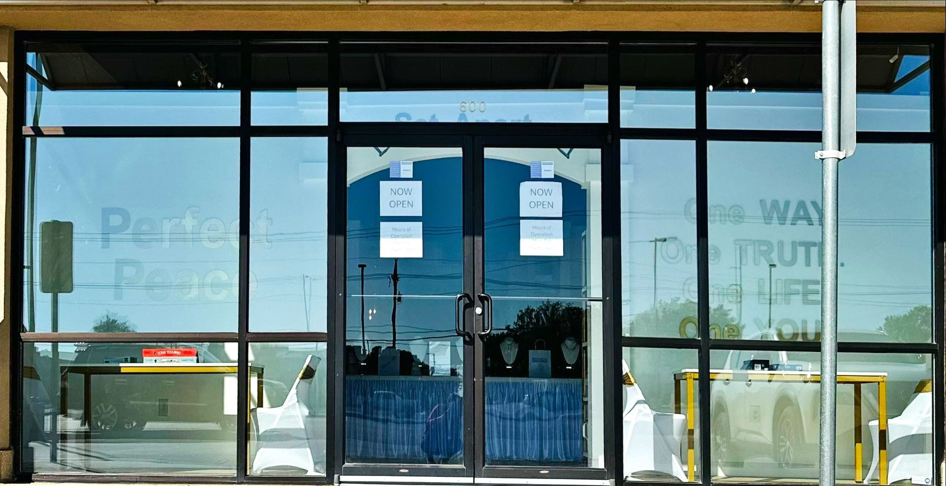 Storefront with glass doors and windows