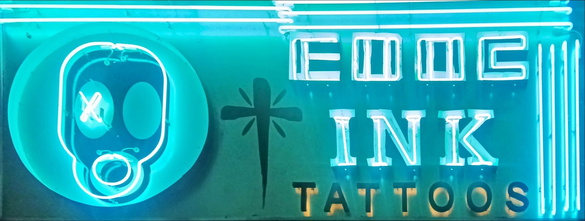 Neon sign with skull logo