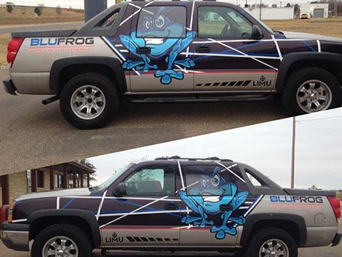 A truck with a blue frog on the side of it