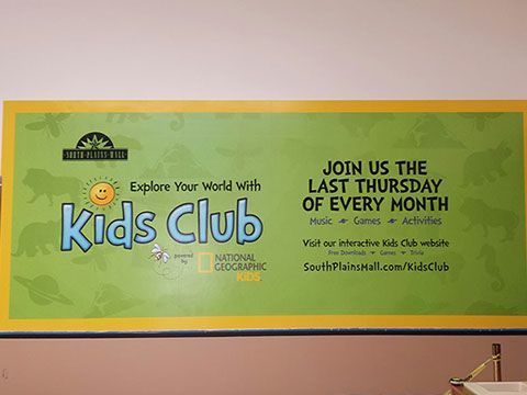 A sign on a wall that says `` join us the last thursday of every month ''.
