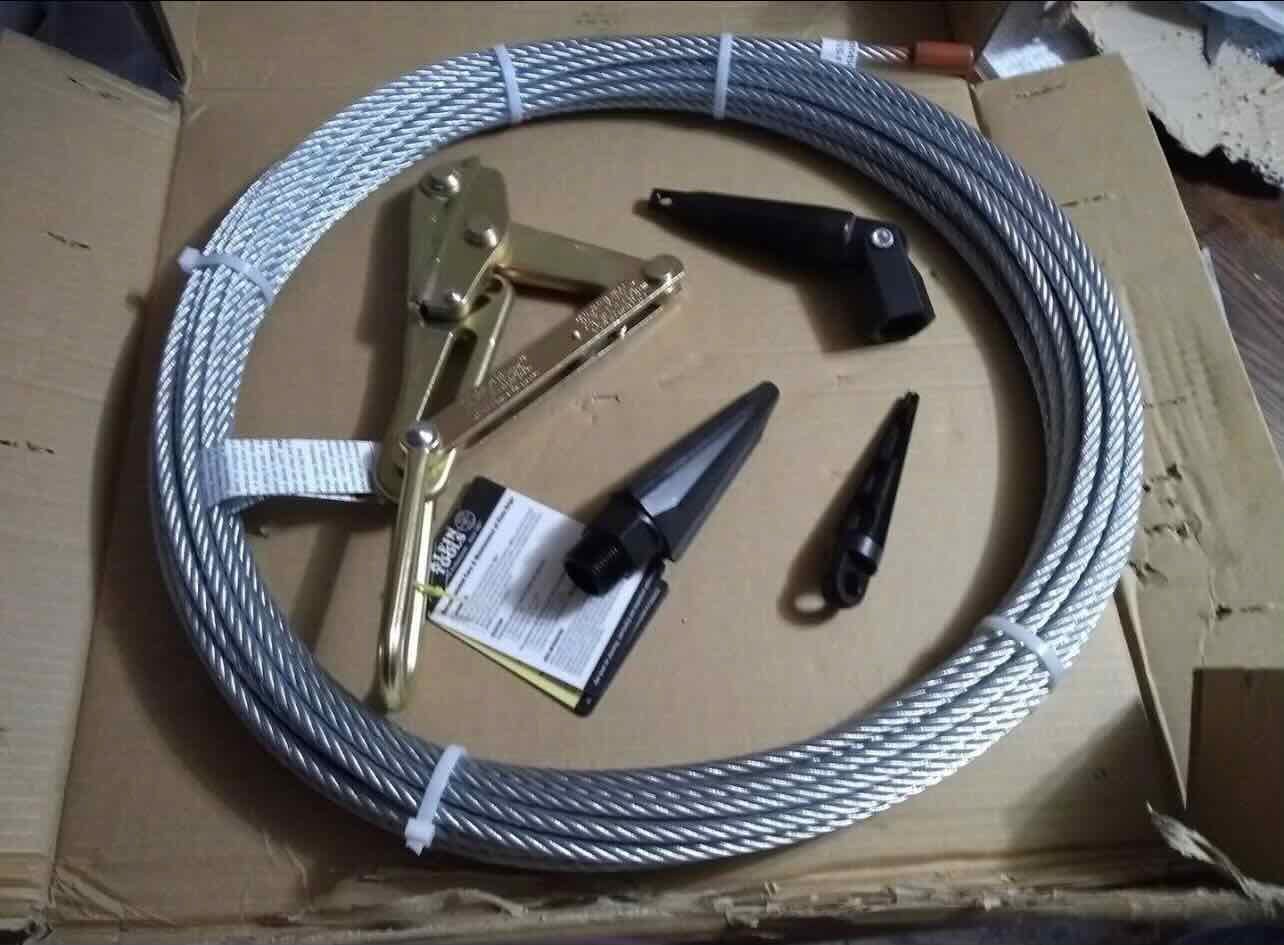 A coil of wire is sitting on top of a cardboard box