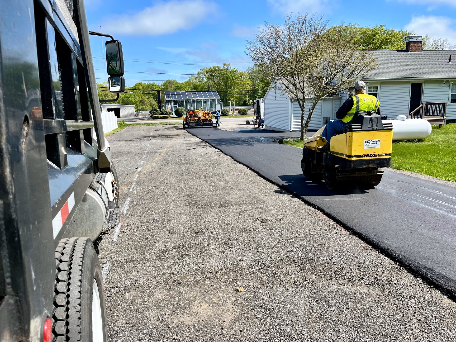 A man is riding a roller on a road.