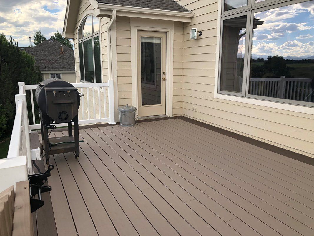Custom raised deck and stairs covered patio