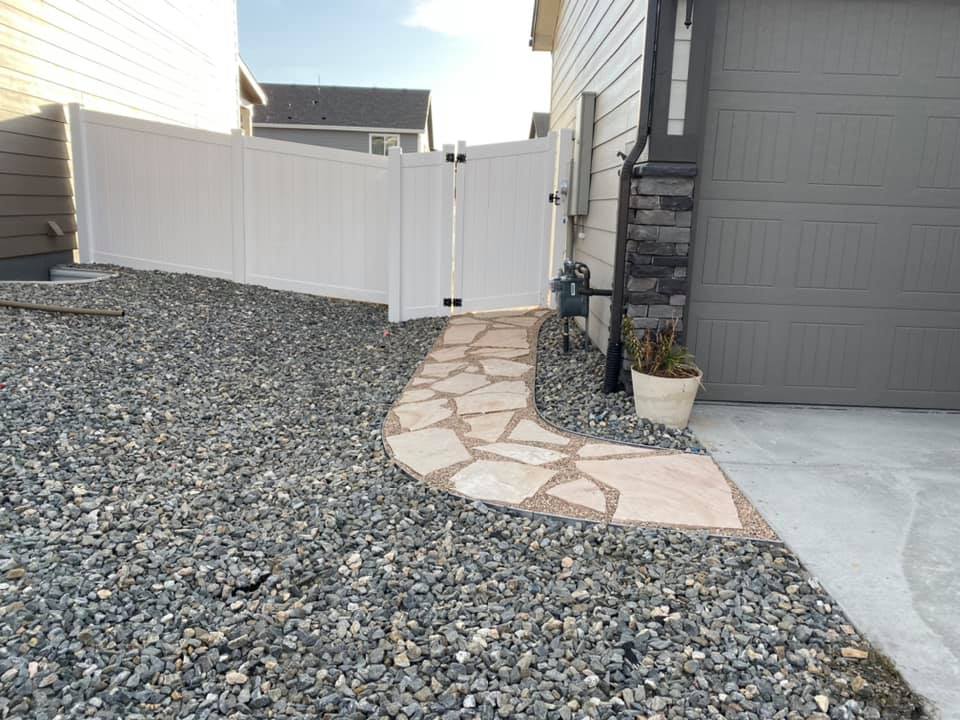 Grouted flagstone path with gravel xeriscape landscaping - no water - easy maintenance -