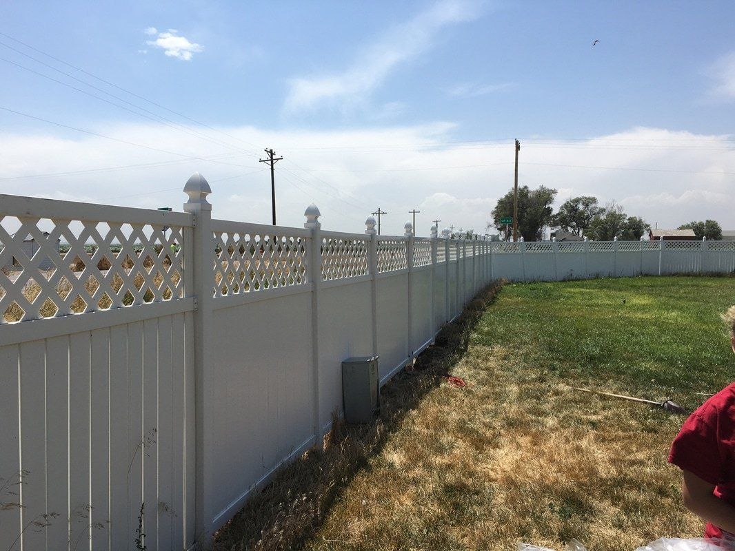 Decorative white vinyl privacy fence