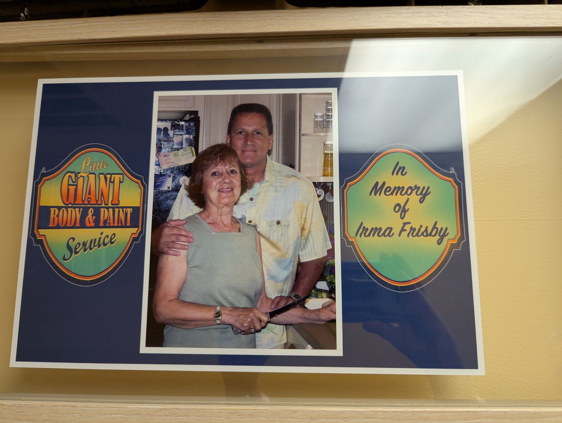 A framed picture of a man and woman