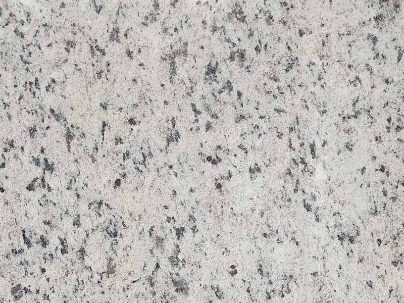 White granite with small, dark gray speckles.