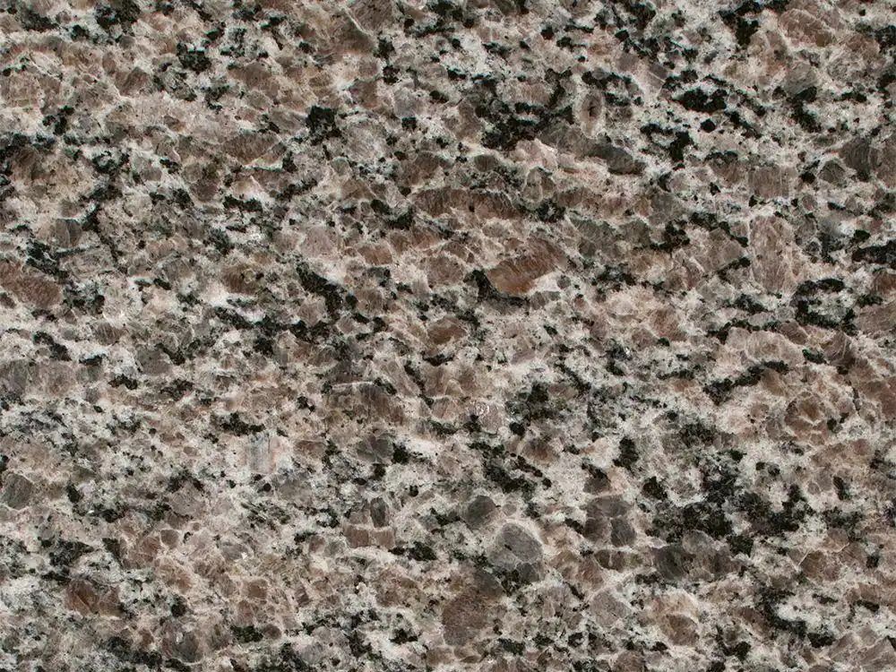 Brown and gray granite surface with speckled patterns.