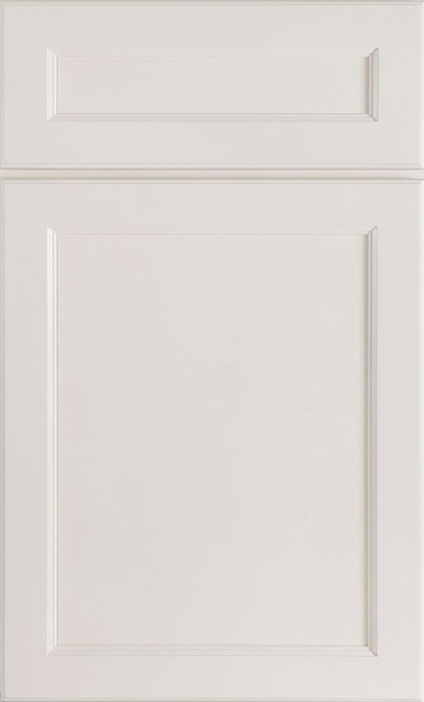 White cabinet door with recessed panel and raised upper panel.