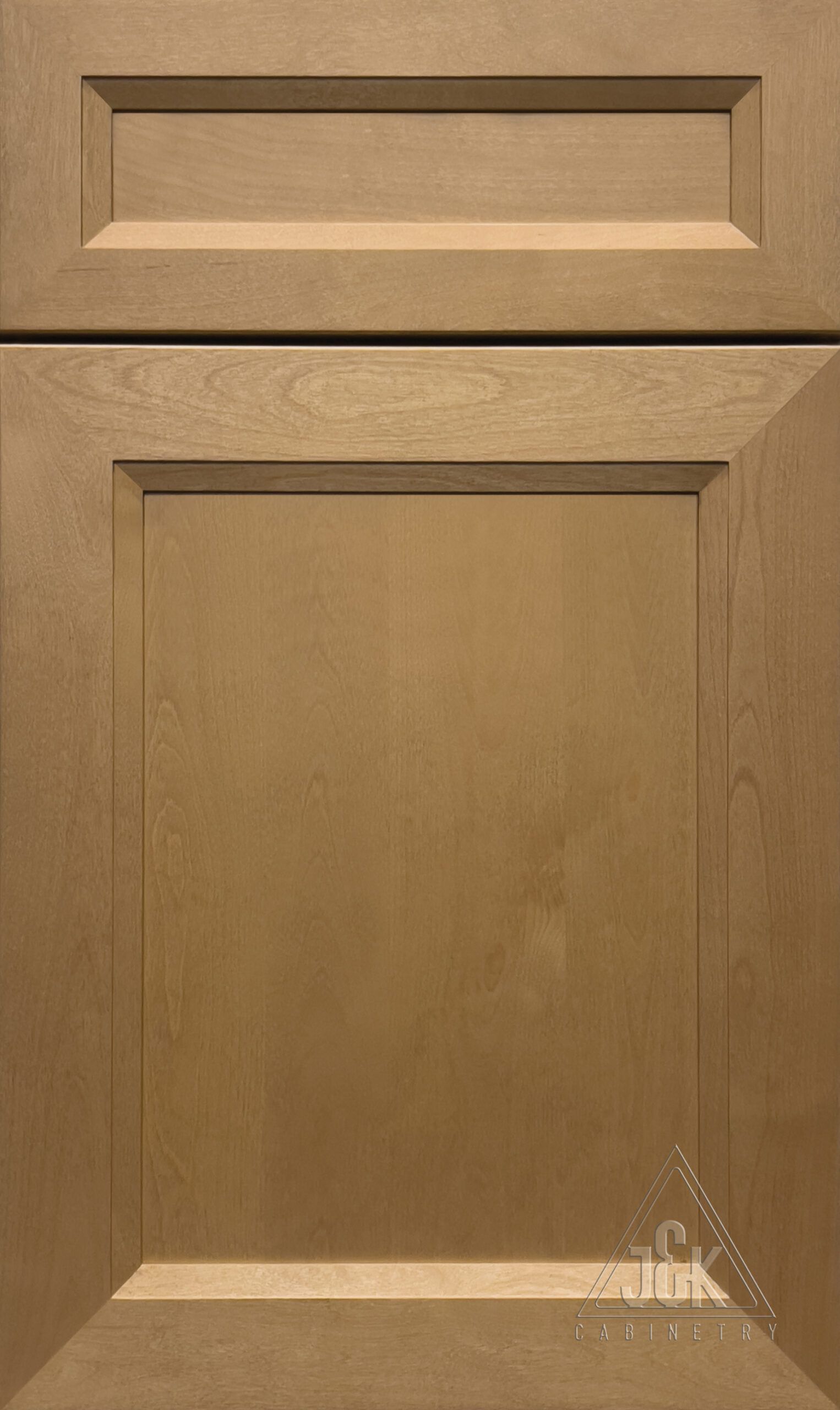 Tan-colored cabinet door with a raised panel and a rectangular top detail.