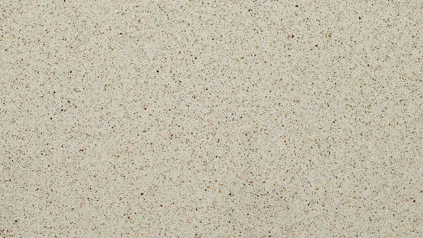 Beige and speckled textured surface.