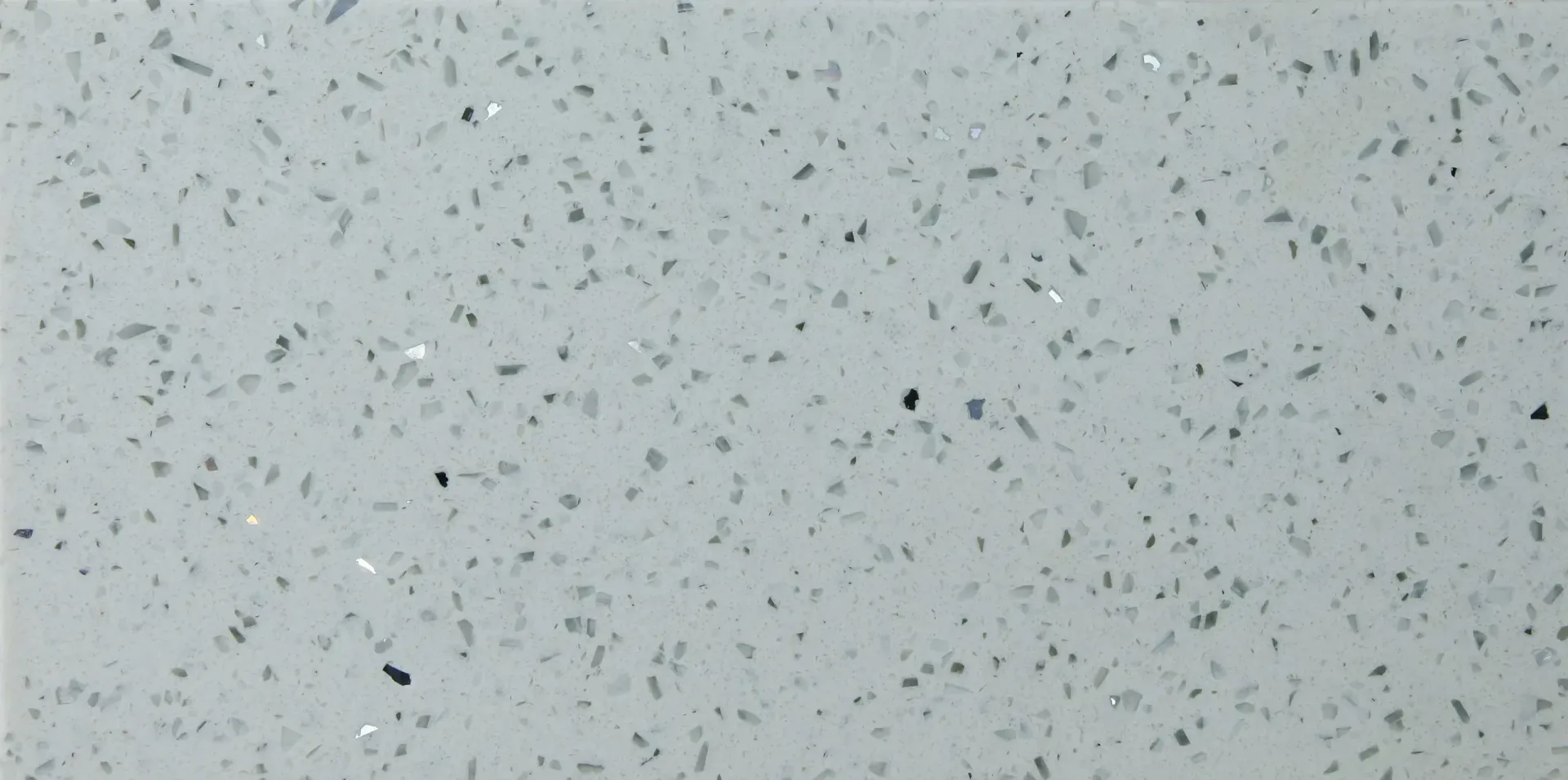 Light gray speckled surface.