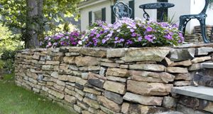 Retaining wall with flower bed