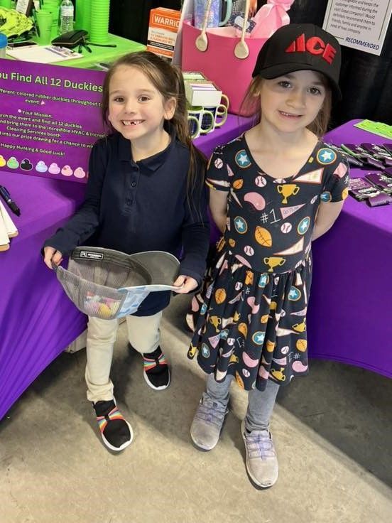 Two little girls at 2025 Tri Cities Home & Garden Show