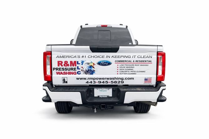 White pickup truck with company logo 