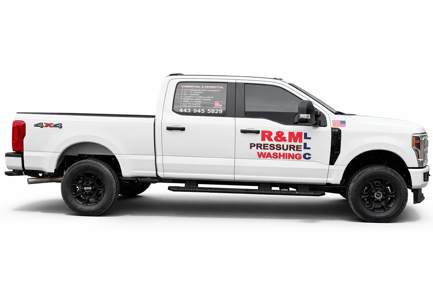 White R&M Pressure Washing pickup truck with company logo, side view on white background