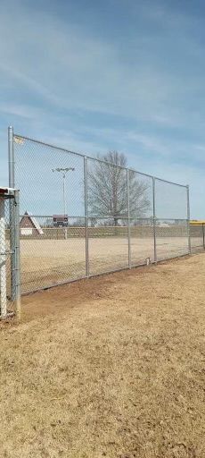 A baseball field with a chain link fence