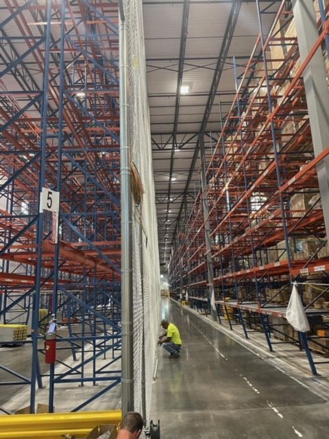 A man is in a warehouse 