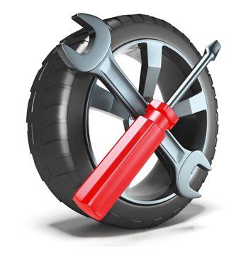 An image of a wheel with a wrench and a screwdriver