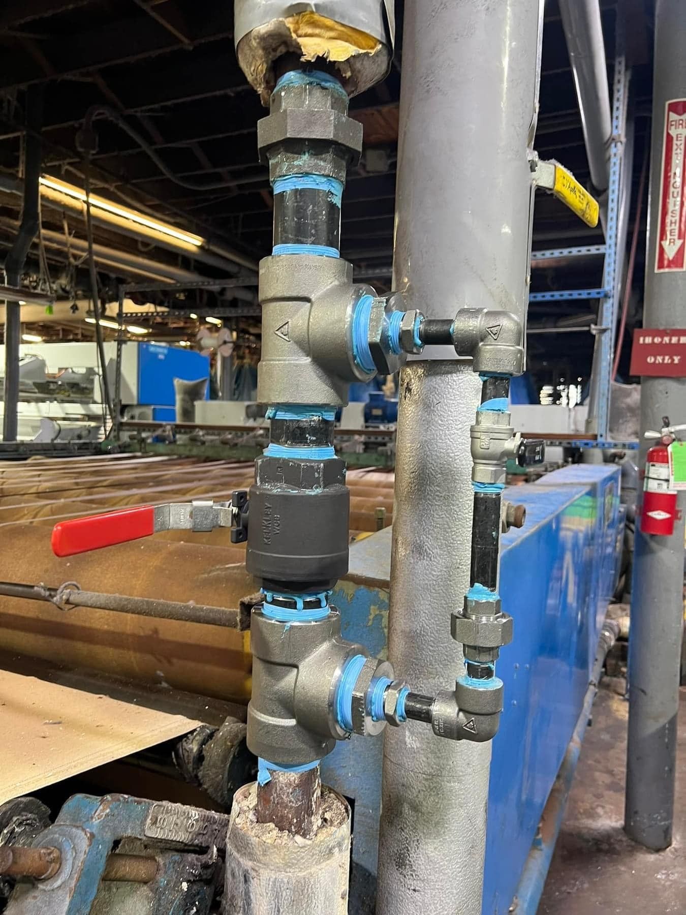 A bunch of pipes are connected to each other in a factory.