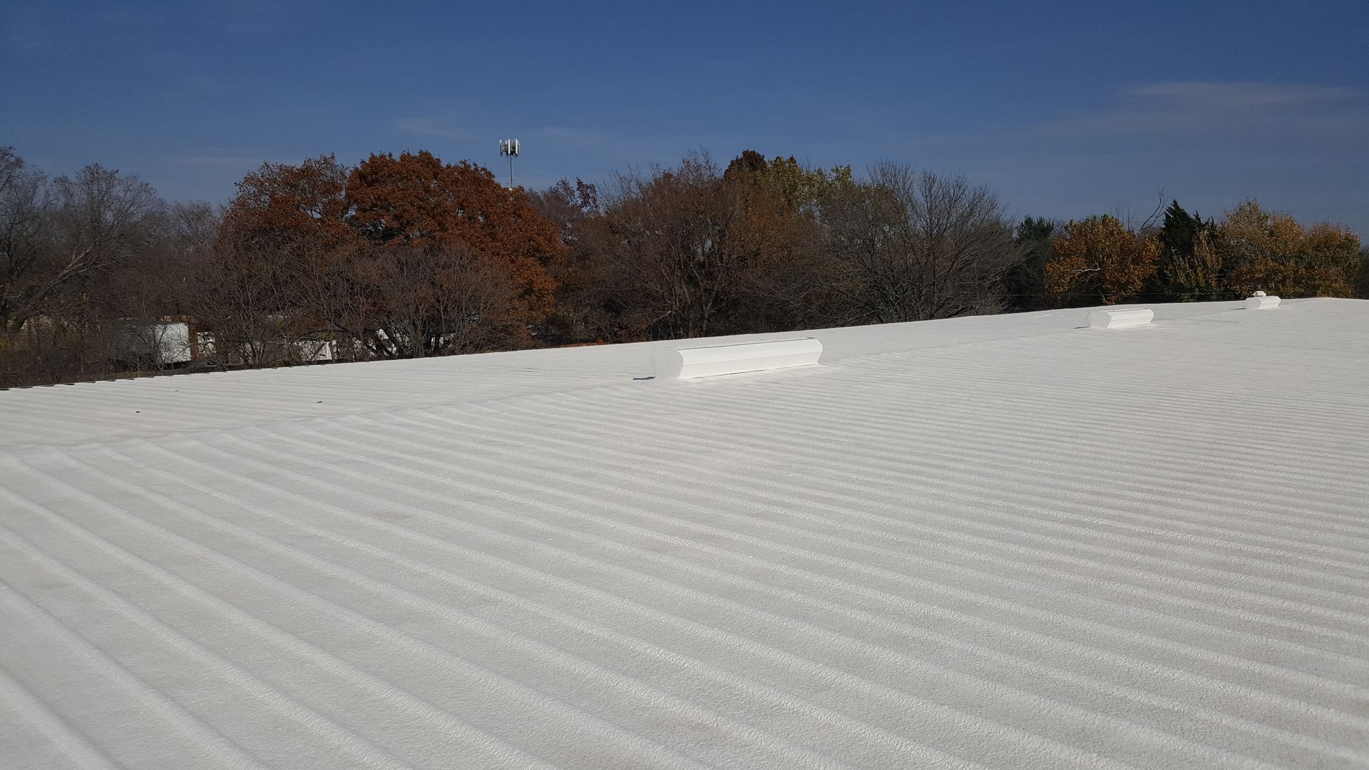 Foam over metal roofing