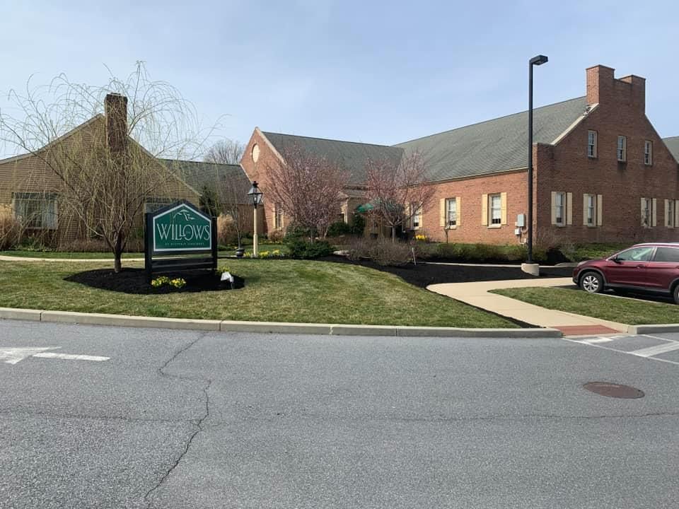 Brick building with a sign that reads 