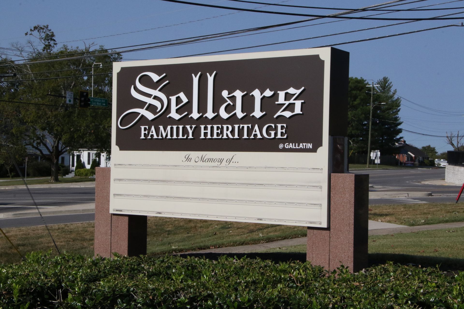 A sign for sellars family heritage sits in the grass