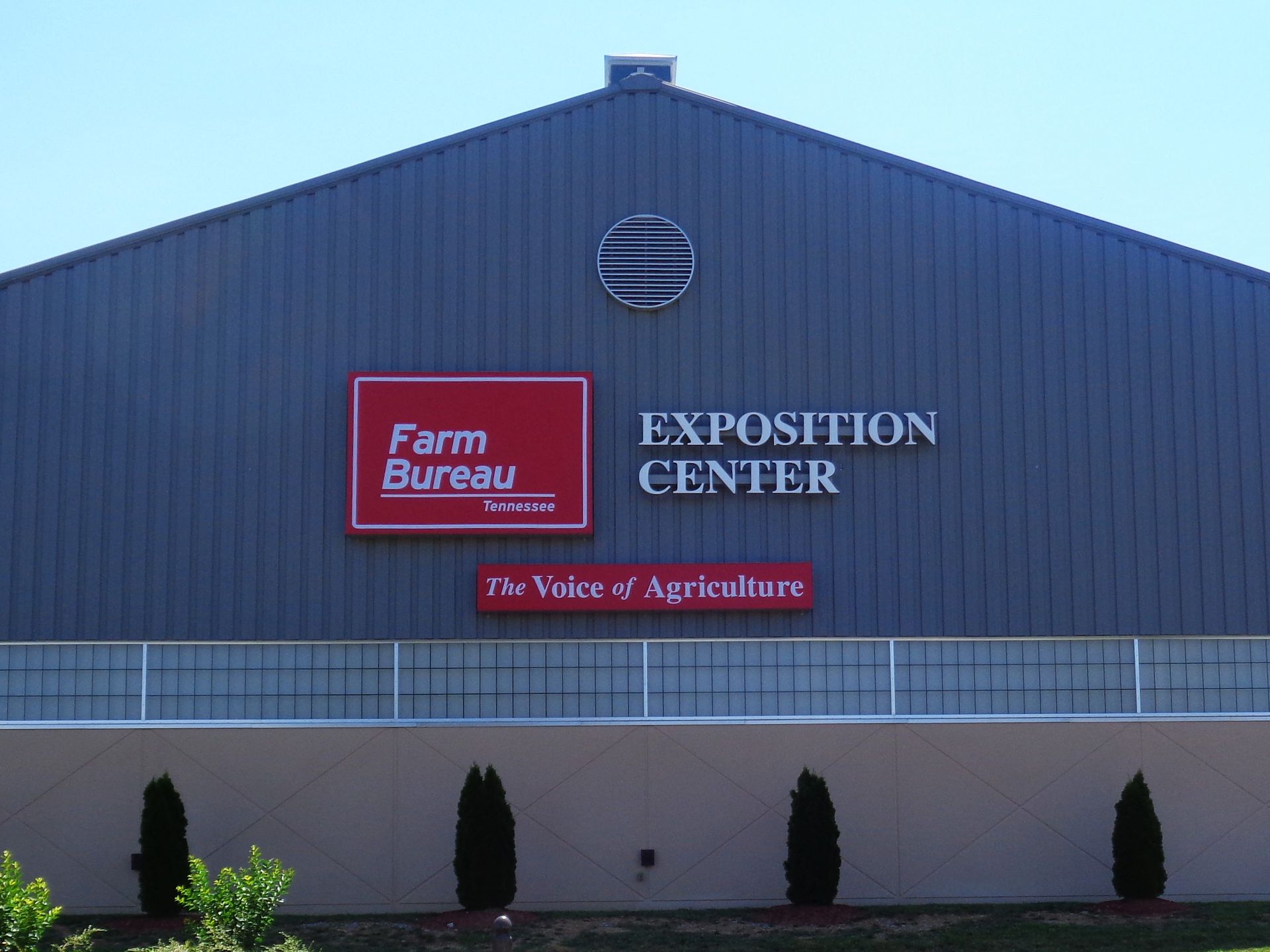A large building with a sign that says farm bureau exposition center