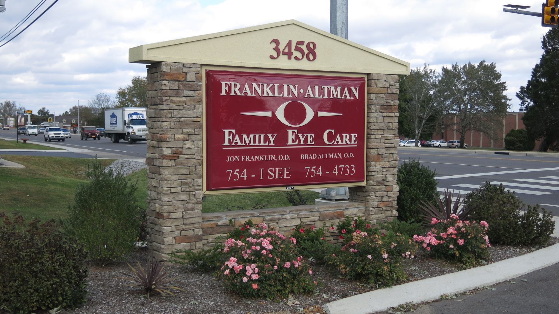 A sign for franklin altman family eye care