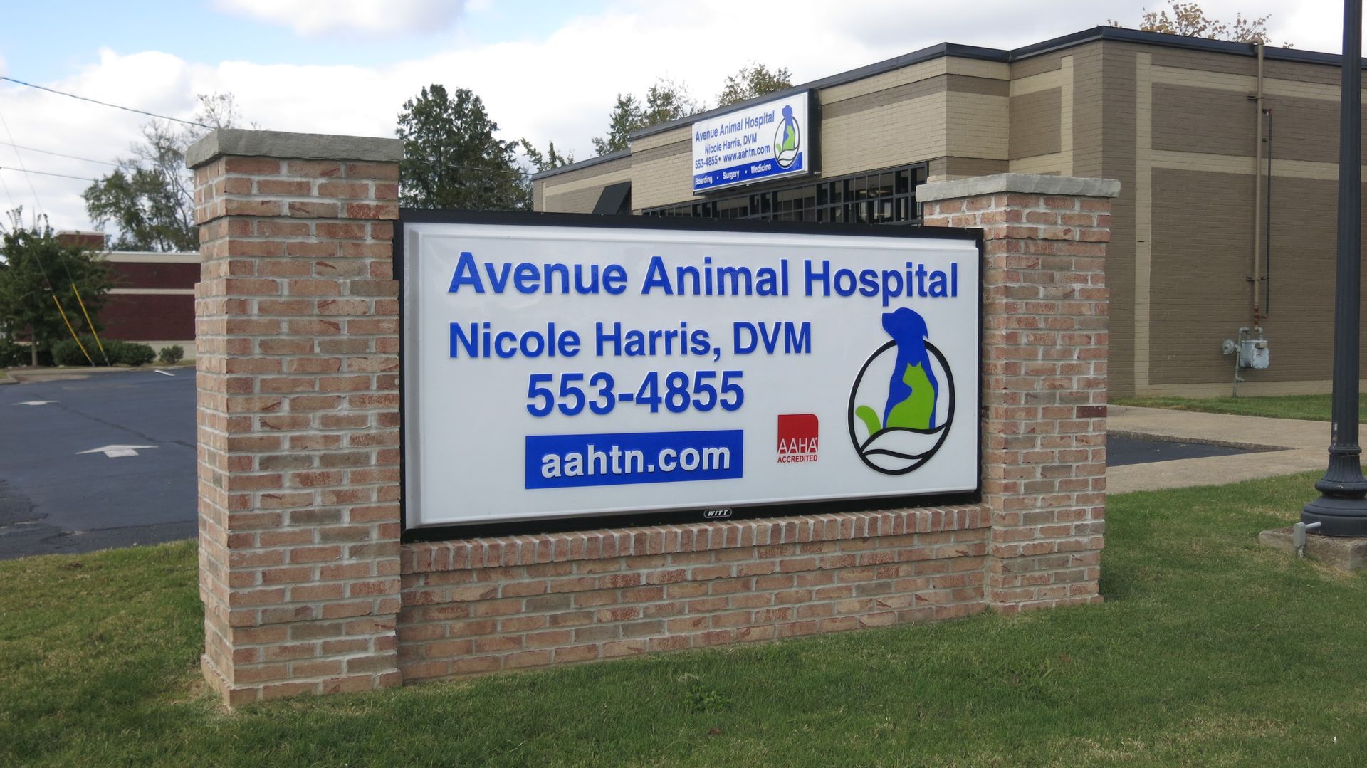 A sign for avenue animal hospital says nicole harris dvm 553-4858