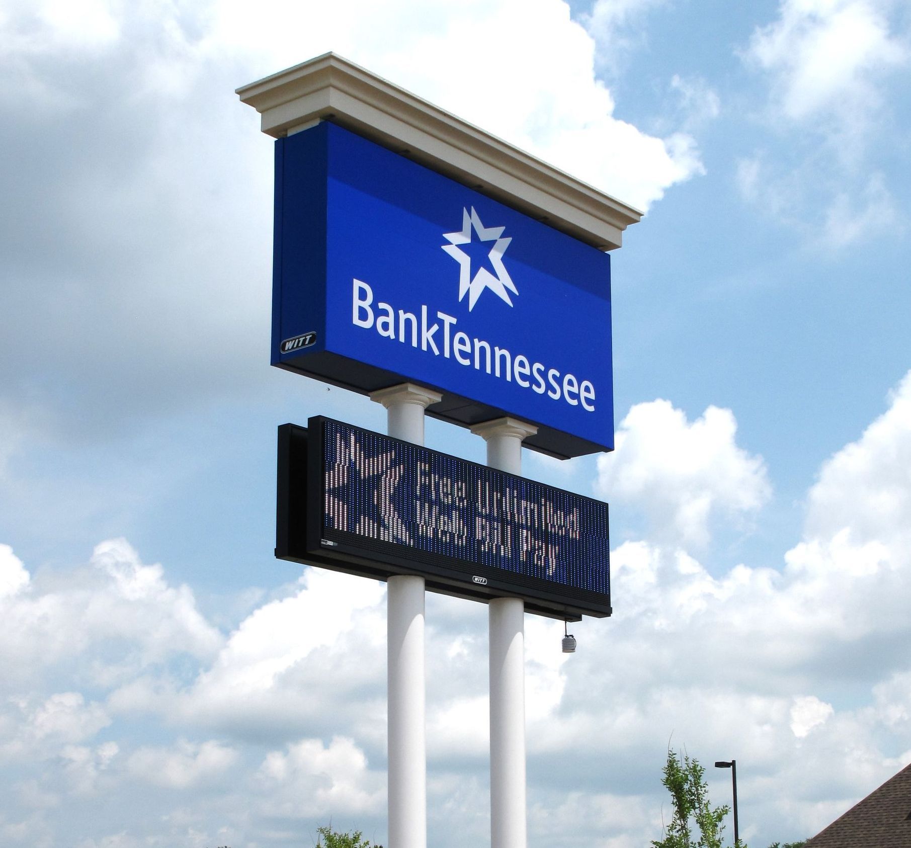 A blue bank tennessee sign with a star on it