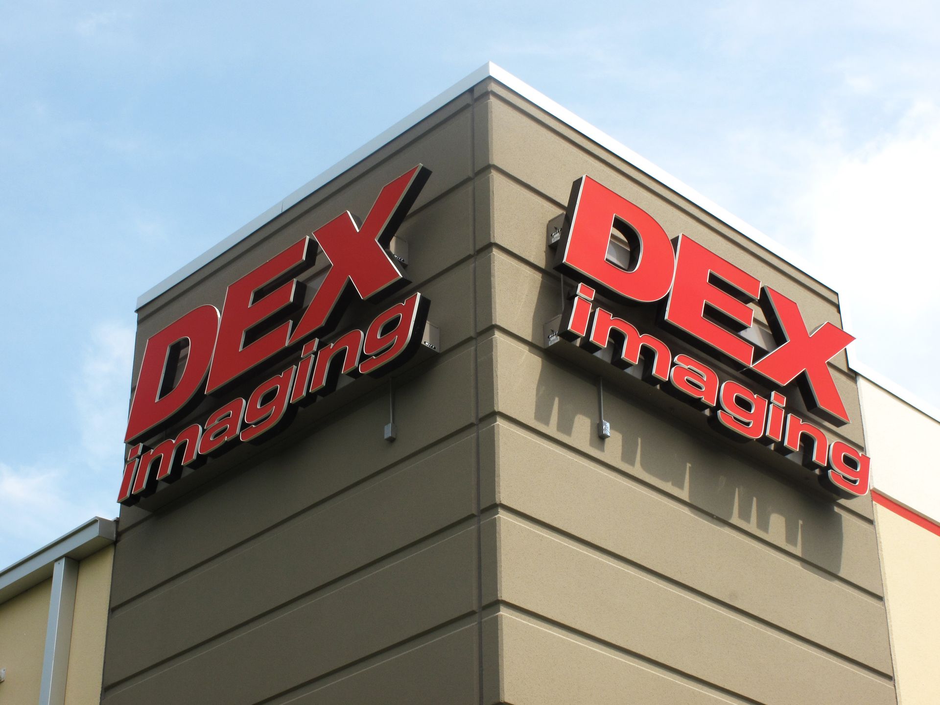 A building with the word dex imaging on it