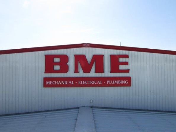 Bme mechanical electrical and plumbing sign on a building