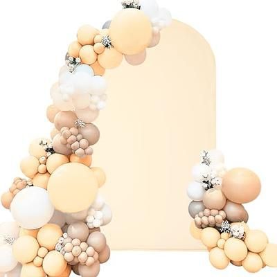 Arch frame backdrop with balloons surrounding it