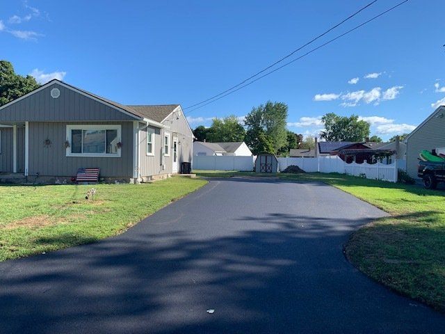 houses with asphalt driveway