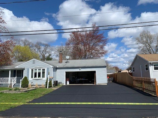 Residential asphalt driveway paving