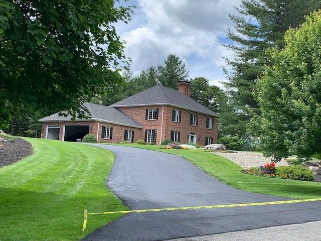 Residential asphalt driveway resurfacing