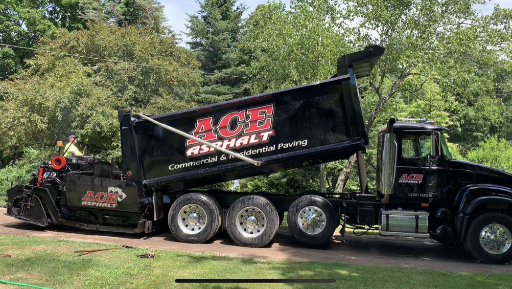 Ace Asphalt residential and commercial paving trucks
