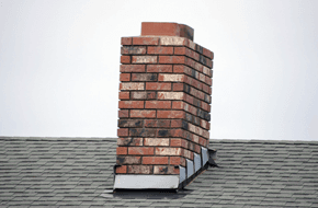 Repaired roof with chimney